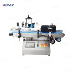 Etiquetadora automática de sobremesa para botellas redondas pequeñas con sistema autoadhesivo