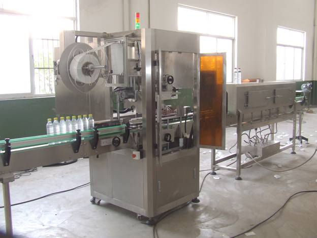 pvc shrinking labeling equipment for bottles Máquina etiquetadora de fundas de PVC para botellas PET