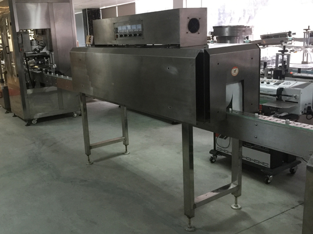 Línea de sellado de tapas retráctil.jpg