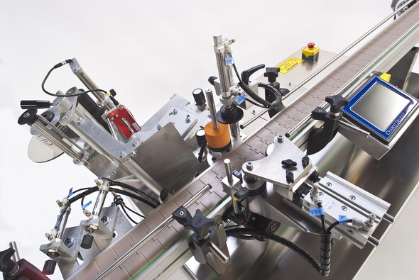 round bottle labeler equipment Equipo para etiquetar botellas redondas.jpg