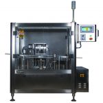 Máquina automática de llenado, sellado y taponado de jeringas inyectoras preesterilizadas