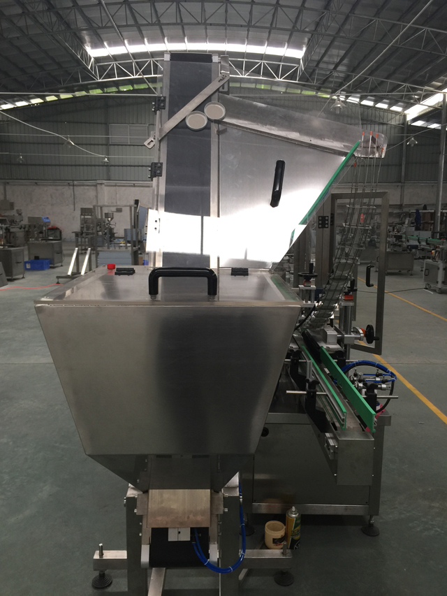 Sistema de alimentación automática de tapas.jpg