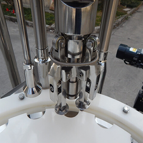 ropp capping heads for vial capper Equipo para tapado de botellas ROPP.jpg