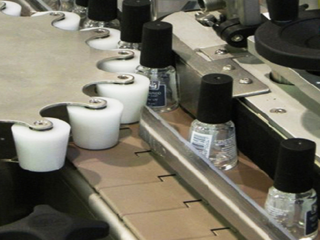 Botellas con rueda de estrella giratoria para etiquetado.jpg