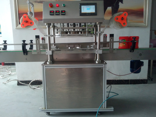 automatic three heads jars sealing equipment Maquina selladora de tarros.jpg