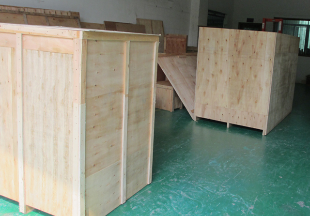Embalaje de caja de madera para línea de llenado.jpg