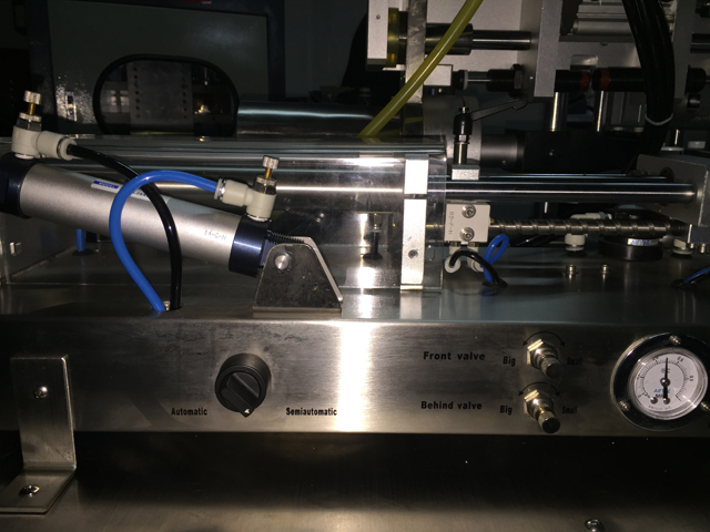 horizontal filling machine for filling process Maquina llenadora horizontal para tubos llenadora selladora.jpg