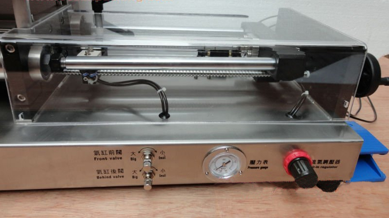 pneumatic part from cream filling machine Primer plano de la máquina de tolva de doble cara con atasco.jpg