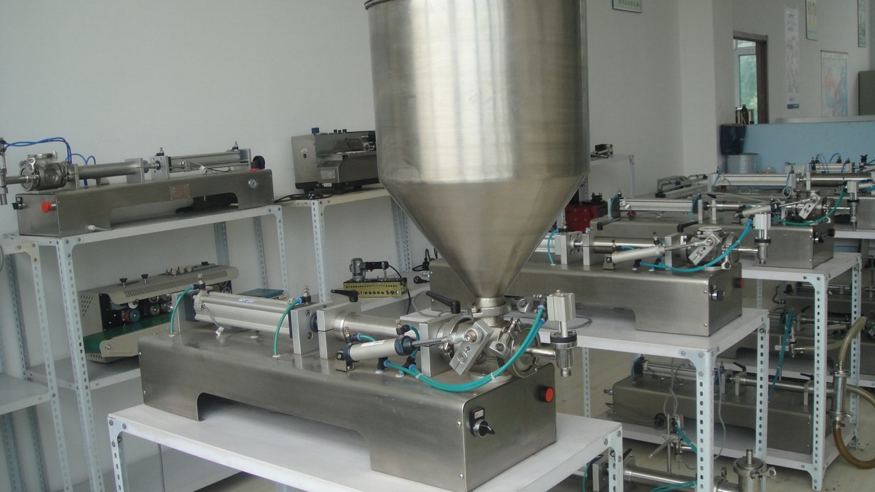 liquid cream lotion filling equipment pneumatic Maquina llenadora de CREMA y LIQUIDO.jpg