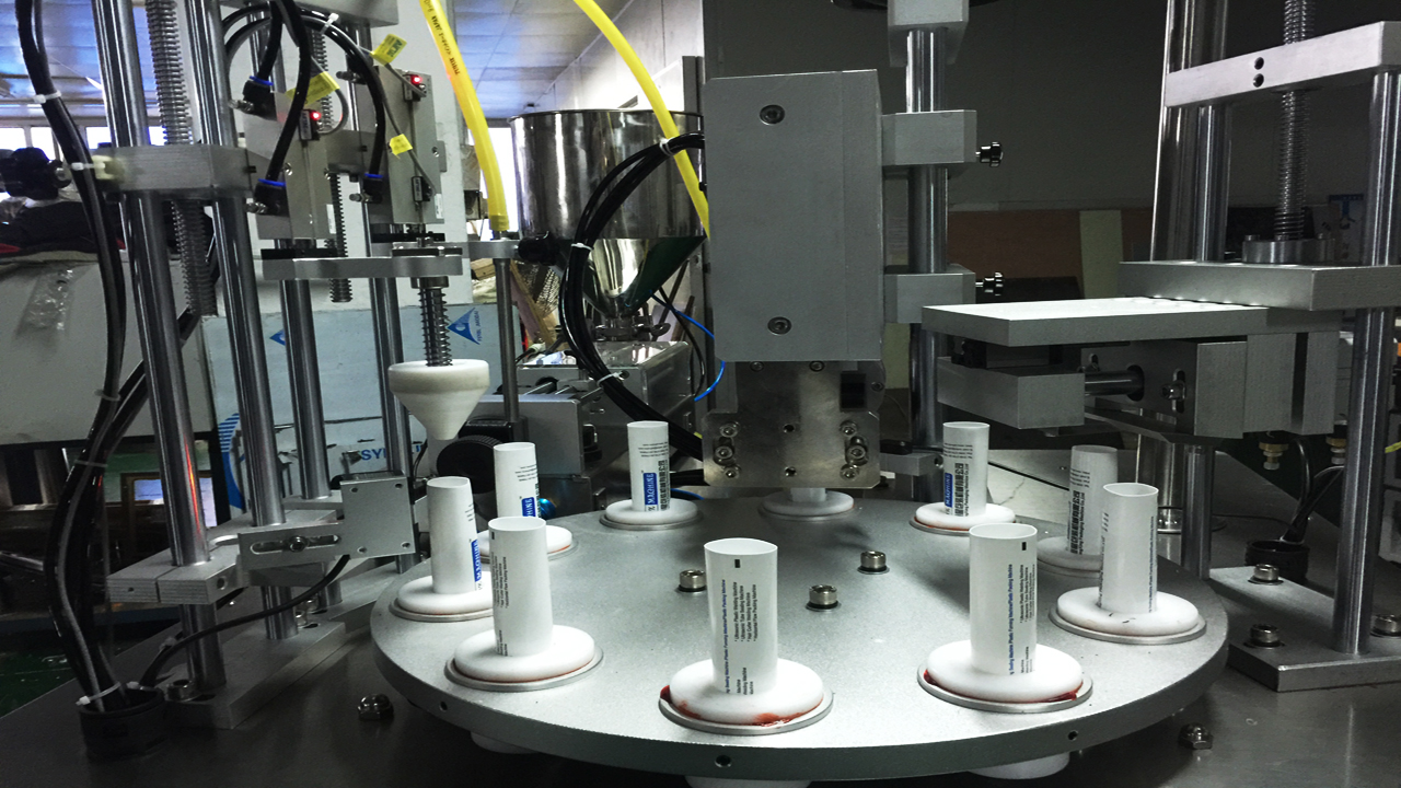 rotary filling sealing machine Sellado de tubos ultrasónicos de llenado rotatorio.jpg