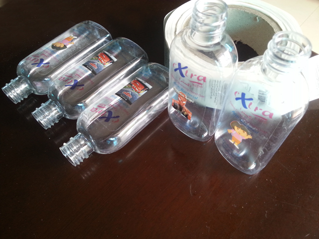 transparent labels labelled samples bottles plane surface Etiquetas y botellas transparentes de muestra de Mrwan (3).jpg