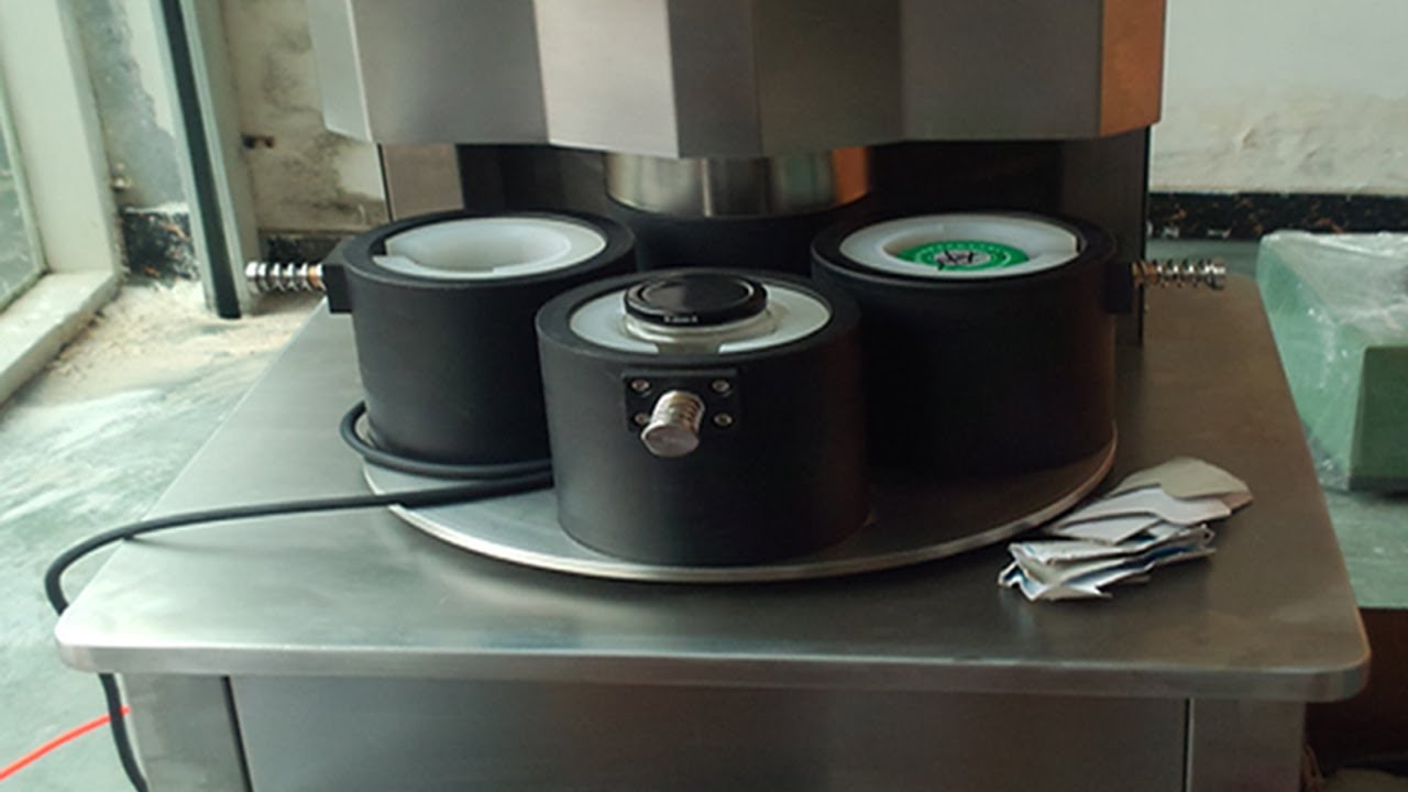 four heads vacuum capping machine semi automatic manual de tapadora al vacio.jpg