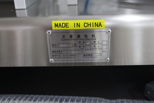 Máquina llenadora con boquillas de llenado dobles.jpg