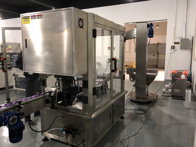 Dibujo de máquina tapadora de tarros de crema (2).jpg